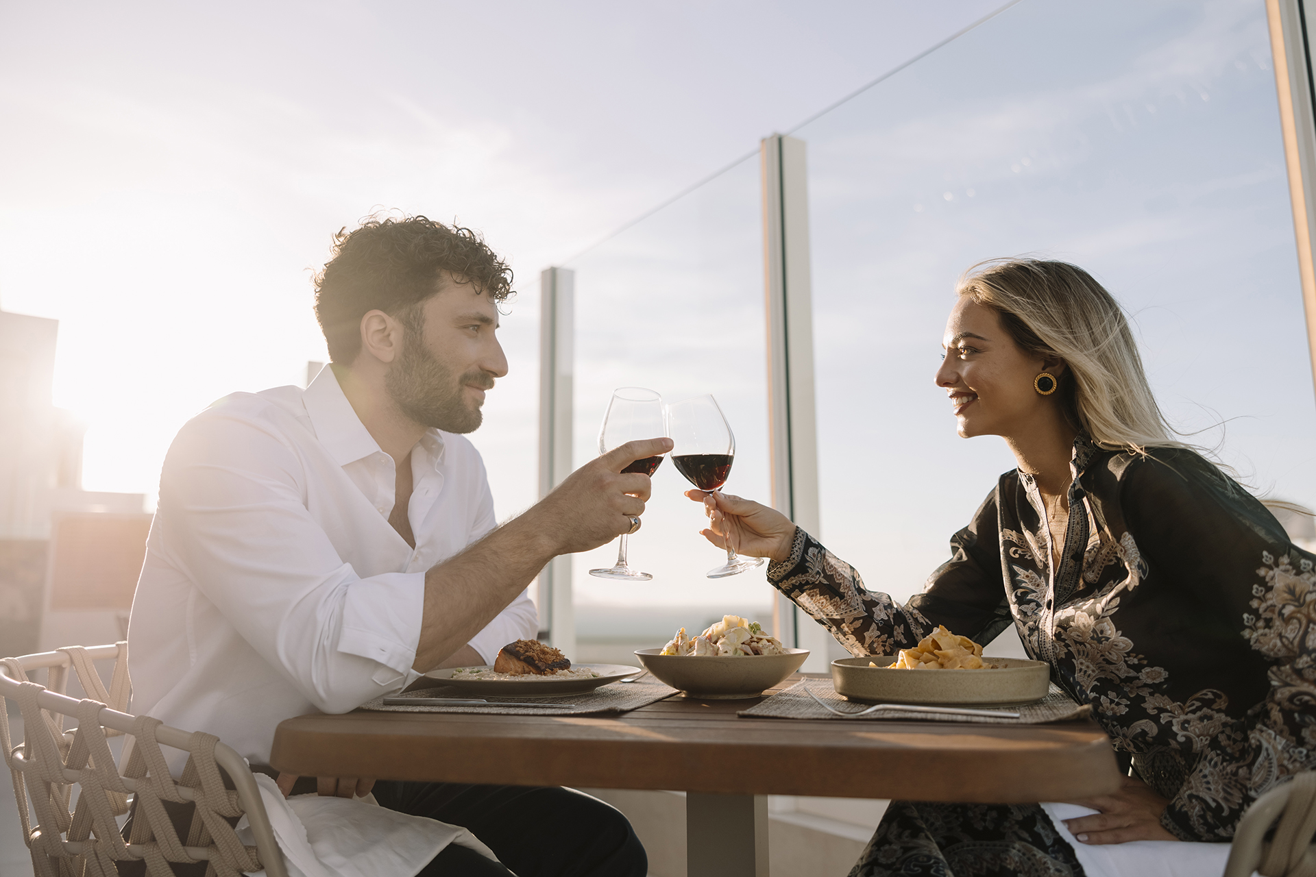 Ethereal White Resort Heraklion Sky Bar Restaurant couple enjoying lunch at the Sky Bar Restaurant