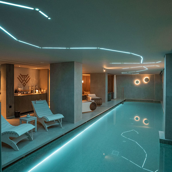 Ethereal White Resort Heraklion Spa indoor swimming pool and sunbeds