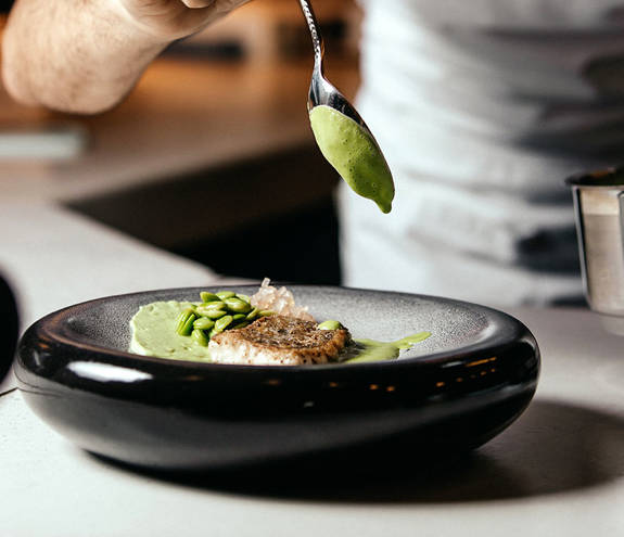 Ethereal White Resort Heraklion front view cook preparing food