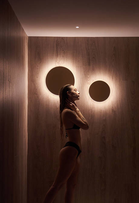 Ethereal White Resort Heraklion Spa visitor posing at the corridor